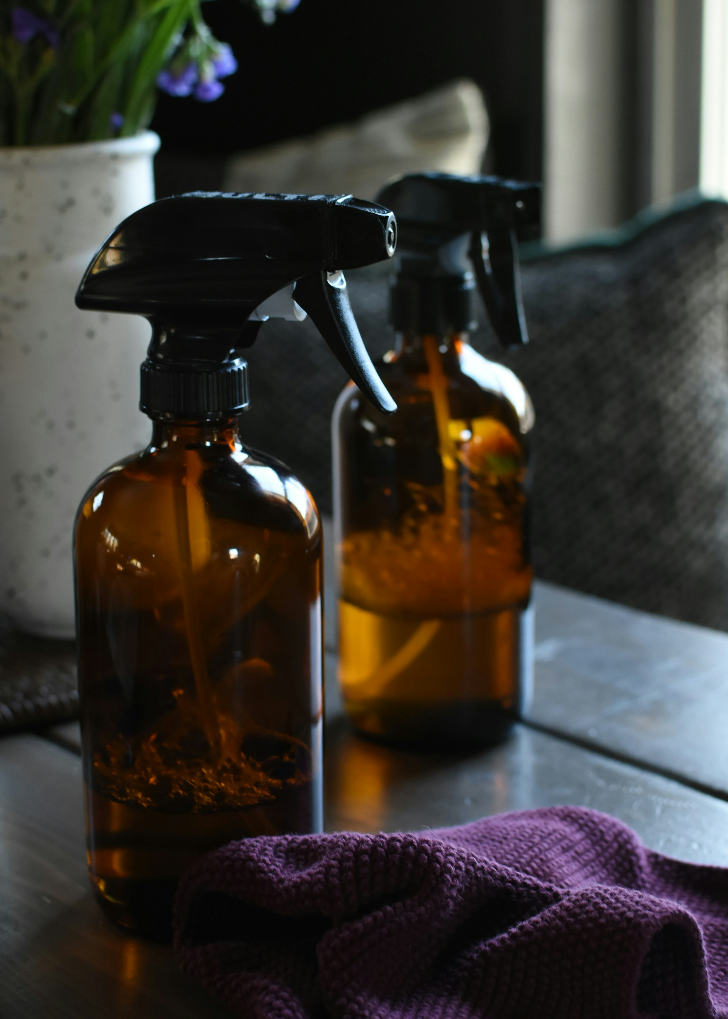 Natural eco-friendly cleaning supplies and ingredients beautifully arranged, showcasing non-toxic household products